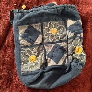 Blue Patchwork Drawstring Bag with Floral Design